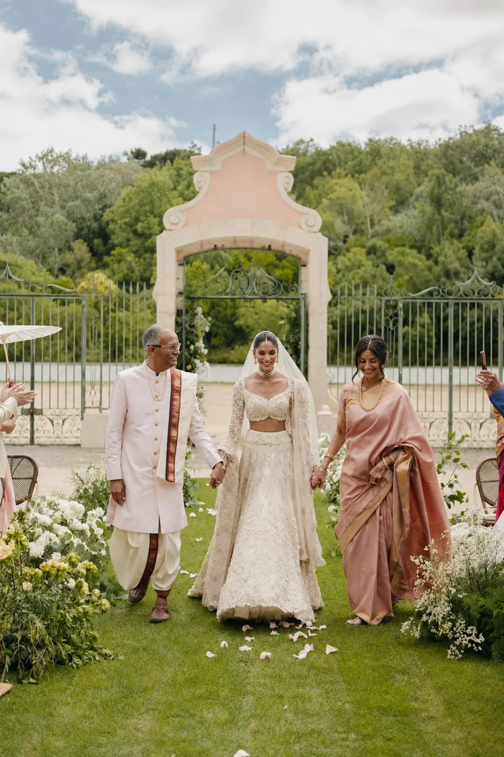 A family walking together at an Indian wedding