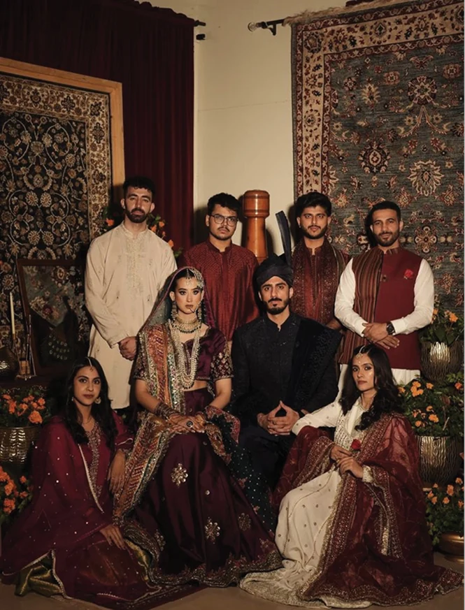 Family dressed in traditional Indian celebration attire